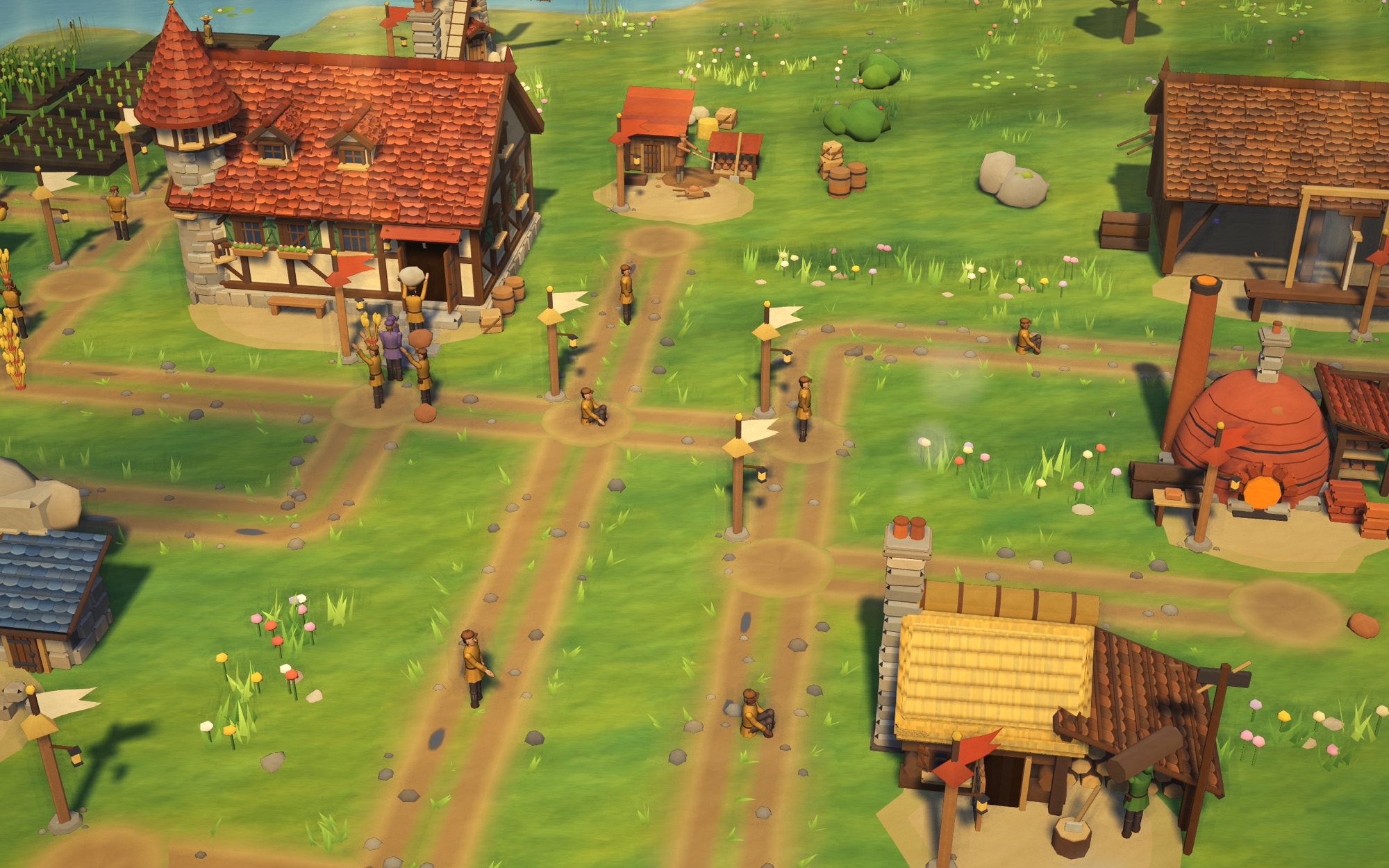 A busy waypost plaza: flag, worn ground ring, kerbed roads meeting, and people resting or carrying goods